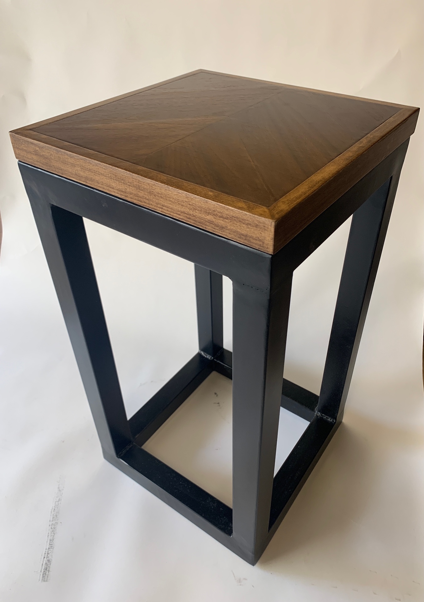 Walnut & Steel Side Table — Sunburst walnut top · blackened steel frame